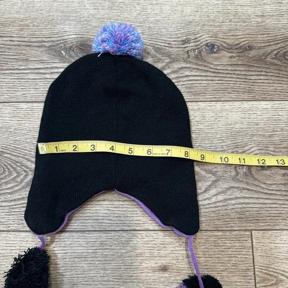 Penguin snow hat, black with white & purple, tassles, purple lining, stretchy.